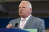Ontario Premier Doug Ford delivers remarks at Lakeshore Collegiate Institute in Toronto, on Thursday, Aug. 31, 2023. Ford is calling on the Bank of Canada to halt future interest rate hikes which he says are having a 