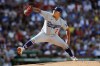 Los Angeles Dodgers starting pitcher Julio Urias pitches during the first inning of a baseball game against the Boston Red Sox, Saturday, Aug. 26, 2023, in Boston. (AP Photo/Michael Dwyer)