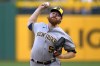 Milwaukee Brewers starting pitcher Brandon Woodruff delivers during the first inning of a baseball game against the Pittsburgh Pirates in Pittsburgh, Tuesday, Sept. 5, 2023. The Brewers won 7-3. (AP Photo/Gene J. Puskar)