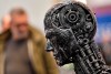 A global group of 25 organizations including news and publishing companies is calling on developers, operators and deployers of artificial intelligence systems to respect intellectual property rights. A metal head made of motor parts symbolizes artificial intelligence, or AI, at the Essen Motor Show for tuning and motorsports in Essen, Germany on Nov. 29, 2019, file photo. THE CANADIAN PRESS/AP/Martin Meissner