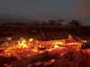 A wildfire burns in Kihei, Hawaii early Thursday, Aug. 10, 2023. Thousands of residents raced to escape homes on Maui as blazes swept across the island, destroying parts of a centuries-old town in one of the deadliest U.S. wildfires in recent years.  (AP Photo/Ty O'Neil)
