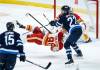 JOHN WOODS / THE CANADIAN PRESS
                                Winnipeg&rsquo;s Mason Appleton upends Calgary&rsquo;s Ilya Solovyov on Wednesday during a preseason game between the Jets and the Flames.