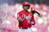 Cincinnati Reds' Noelvi Marte tosses his arm guard after being hit by a pitch during the second inning of a baseball game against the Seattle Mariners in Cincinnati, Monday, Sept. 4, 2023. (AP Photo/Aaron Doster)