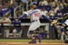 Los Angeles Dodgers' Mookie Betts reacts as he strikes out swinging during the first inning of a baseball game against the Miami Marlins, Wednesday, Sept. 6, 2023, in Miami. (AP Photo/Wilfredo Lee)