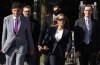 Lawyer Lawrence Greenspon (left) walks with Tamara Lich as they make their way to the courthouse on the first day of trial, in Ottawa, Tuesday, Sept. 5, 2023. The lawyers defending two of the most prominent organizers of the 