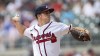 Atlanta Braves starting pitcher Allan Winans throws to a Pittsburgh Pirates batter in the first inning of a baseball game, Sunday, Sept. 10, 2023, in Atlanta. (AP Photo/Hakim Wright Sr.)