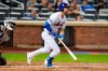 New York Mets' Jeff McNeil, right, watches his home run during the fourth inning of a baseball game against the Arizona Diamondbacks, Monday, Sept. 11, 2023, in New York. (AP Photo/Frank Franklin II)