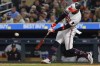 Minnesota Twins' Willi Castro hits a two-run home run against the Tampa Bay Rays during the seventh inning of a baseball game Tuesday, Sept. 12, 2023, in Minneapolis. (AP Photo/Bruce Kluckhohn)