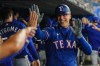 Texas Rangers' Nathaniel Lowe celebrates his three-run home run against the Toronto Blue Jays during fourth inning American League MLB baseball action in Toronto on Wednesday, September 13, 2023. THE CANADIAN PRESS/Nathan Denette
