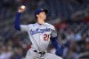 FILE - Los Angeles Dodgers starting pitcher Walker Buehler throws to a Washington Nationals batter during a baseball game May 24, 2022, in Washington. Buehler said Wednesday, Sept. 13, 2023, he shut down his comeback from Tommy John surgery this season because he wasn't recovering well after a rehab start. The right-hander tossed two scoreless innings in a rehab appearance on Sept. 3 for Triple-A Oklahoma City. (AP Photo/Nick Wass, File)