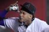 Arizona Diamondbacks' Ketel Marte splashes water on his face in the dugout prior to a baseball game against the San Francisco Giants, Wednesday, Sept. 20, 2023, in Phoenix. (AP Photo/Ross D. Franklin)