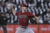 Arizona Diamondbacks starter Zach Davies delivers a pitch during the first inning of the team's baseball game against the Chicago White Sox on Tuesday, Sept. 26, 2023, in Chicago. (AP Photo/Paul Beaty)