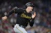 Pittsburgh Pirates' Henry Davis runs after hitting a two-run single against Philadelphia Phillies pitcher Ranger Suarez during the third inning of a baseball game, Wednesday, Sept. 27, 2023, in Philadelphia. (AP Photo/Matt Slocum)