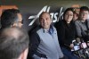 San Francisco Giants president of baseball operations Farhan Zaidi, middle, speaks to reporters in San Francisco, Tuesday, Oct. 3, 2023. (AP Photo/Jeff Chiu)