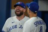Blue Jays manager John Schneider was thrown a curveball Wednesday when his pre-game media availability was interrupted by a countrywide test of the emergency alert system.&nbsp;Schneider (left) shares a laugh with right fielder George Springer before American League MLB baseball action against the Houston Astros, in Toronto on Thursday, June 8, 2023. THE CANADIAN PRESS/Chris Young