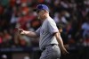 Texas Rangers manager Bruce Bochy (15) signaling to the bullpen for a pitching change during the fourth inning in Game 1 of an American League Division Series baseball game against Baltimore Orioles, Saturday, Oct. 7, 2023, in Baltimore, Md. (AP Photo/Andrew Harnik)