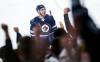 Dylan DeMelo celebrates his goal against the Florida Panthers during the second period. (John Woods / The Canadian Press)