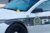 A police forensics unit is at Broadway and Sherbrook Avenue Monday morning at a scene that includes a police car. (Mike Deal / Winnipeg Free Press)