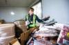 MIKAELA MACKENZIE / WINNIPEG FREE PRESS
                                Volunteer Rouven Hoffmann stocks the freezer with meat at Harvest Manitoba on Friday, Oct. 27, 2023. For Malak story. Winnipeg Free Press 2023.