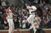 Atlanta Braves' Travis d'Arnaud (16) runs the bases and celebrates his two-run homer against the Philadelphia Phillies in the seventh inning of Game 2 of a baseball NL Division Series, Monday, Oct. 9, 2023, in Atlanta. (AP Photo/Brynn Anderson)