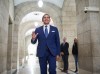 Manitoba premier-designate Wab Kinew is promising more funding to municipalities, but there are no details yet. Kinew walks to the Premier's office to meet with outgoing Manitoba Premier Heather Stefanson in Winnipeg on Thursday, Oct. 5, 2023. THE CANADIAN PRESS/David Lipnowski