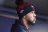 Minnesota Twins' Byron Buxton watches from the dugout in the seventh inning of Game 3 of an American League Division Series baseball game against the Houston Astros, Tuesday, Oct. 10, 2023, in Minneapolis. (AP Photo/Bruce Kluckhorn)