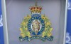 The RCMP logo is seen on a podium ahead of a news conference, in St. John's on Saturday, June 24, 2023. The RCMP says it's aware of social media posts threatening the Jewish community in Canada, calling it a time for 