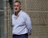 FILE - St. Louis Cardinals president of baseball operations John Mozeliak watches spring training baseball practice Feb. 15, 2023, in Jupiter, Fla. Authorities are seeking at least five people in an armed robbery of the Cardinals complex in the Dominican Republic, Friday, Oct. 13, 2023. A Dominican Republic police spokesman told The Associated Press that the suspects bound and gagged a security guard and stole watches, rings, necklaces and other items from athletes and personnel. (AP Photo/Jeff Roberson, File)