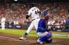 Texas Rangers catcher Jonah Heim reacts after Houston Astros' Yordan Alvarez strikes out during the third inning of Game 1 of the baseball AL Championship Series Sunday, Oct. 15, 2023, in Houston. (AP Photo/Godofredo A. Vasquez)