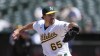 FILE - Oakland Athletics' Trevor May throws during a baseball game against the Houston Astros in Oakland, Calif., Saturday, May 27, 2023. Oakland A's reliefe pitcher Trevor May has announced his retirement from baseball, and in the process, implored owner John Fisher to sell the team. (AP Photo/Jeff Chiu, File)