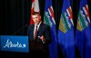 Alberta Finance Minister Nate Horner speaks to the media at a news conference in Calgary, Thursday, June 29, 2023. A spokesperson for Horner says the proposal to have a future Alberta pension plan mirror the controversial Quebec investment model remains on the table for consideration — four days after Horner announced it was off the table. THE CANADIAN PRESS/Jeff McIntosh