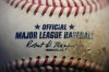 A logo is seen on a Major League baseball, Wednesday, Feb. 22, 2023, in Marple Township, Pa. Police say the Detroit Tigers complex in the Dominican Republic was targeted Wednesday, Oct. 18, 2023, in the latest robbery of a Major League Baseball facility in the country. (AP Photo/Matt Slocum)