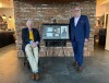 Donald Sutherland and Canada Post President and CEO Doug Ettinger pose with a framed stamp enlargement in a handout photo. Sutherland was using batting as a metaphor on Thursday while speaking about the new Canada Post stamp that will bear his likeness when he segued into talking about Toronto's early exit from Major League Baseball's post-season. THE CANADIAN PRESS/HO-Rossif Sutherland **MANDATORY CREDIT**