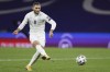 FILE - Israel's Shon Weissman shoots a penalty shot during the Euro 2020 playoff semifinal soccer match between Scotland and Israel, at the Hampden stadium in Glasgow, Scotland, on Oct. 8, 2020. An official for Granada soccer club says that Israel forward Shon Weissman has not traveled with the team for its Spanish league game at Osasuna because of security concerns. The official confirmed Spanish media reports to The Associated Press that Weissman had not gone with his teammates to Pamplona. (AP Photo/Scott Heppell, File)