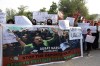 A social group, Aurat March, hold signs during a demonstration against Pakistani government, in Islamabad, Pakistan, Sunday, Oct. 29, 2023. Pakistan says it has recently announced plans to deport all migrants who are in the country illegally, including 1.7 million Afghans, who will be implemented in a 