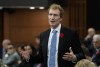 Immigration, Refugees and Citizenship Minister Marc Miller rises during Question Period, in Ottawa, Tuesday, Oct. 31, 2023. New targets tabled in Parliament show the government plans to level out the number of new permanent residents to Canada in 2026, forecasting an end to record-breaking year-over-year immigration.THE CANADIAN PRESS/Adrian Wyld