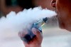 A man exhales while smoking an e-cigarette in Portland, Maine, on&nbsp;August 28, 2019. THE CANADIAN PRESS/AP, Robert F. Bukaty