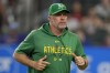 FILE - Oakland Athletics manager Mark Kotsay jogs to the dugout after checking on an injured player during a baseball game against the Texas Rangers, Sunday, Sept. 10, 2023, in Arlington, Texas. The Oakland Athletics believe in Mark Kotsay's leadership through all of the challenges and changes, picking up the manager's contract option for the 2025 season. The club made the announcement Tuesday, Nov. 7, about Kotsay's future following a 50-112 season that came after Oakland went 60-102 in his first season last year. (AP Photo/Tony Gutierrez, File)