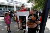 PHIL HOSSACK / WINNIPEG FREE PRESS
                                Felix Thompson accompanied his sister Erica Thompson and their family holds a portrait of his brother Sean Friday night. Sean died in police custody a week ago. See Nicholas&rsquo; story. - July 5, 2019.
