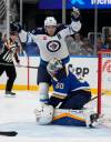 Jeff Roberson / The Associated Press
                                Mark Scheifele celebrates Tuesday after scoring against St. Louis Blues goalie Jordan Binnington in the first period of the Jets&rsquo; 5-2 victory.