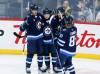 Winnipeg Jets&rsquo; Mark Scheifele (55), Cole Perfetti (91), Alex Iafallo (9) and Kyle Connor (81) celebrate Perfetti&rsquo;s goal against the Nashville Predators during second period NHL action in Winnipeg on Thursday, November 9, 2023. (John Woods / The Canadian Press files)