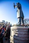 MIKAELA MACKENZIE / WINNIPEG FREE PRESS
                                Metis citizens place roses at the foot of the Louis Riel statue (after the introduction of legislation naming Louis Riel as the honourary first premier of Manitoba was announced) at the legislative building on Thursday, Nov. 23, 2023. For Danielle story. Winnipeg Free Press 2023.
