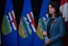 Alberta Premier Danielle Smith is shown during a news conference in Edmonton on Wednesday, Nov. 8, 2023. Alberta’s Opposition leader is calling on Smith to dump the province’s multimillion-dollar ad campaign touting the benefits of quitting the Canada Pension Plan. THE CANADIAN PRESS/Jason Franson