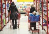 Statistics Canada is expected to release its latest reading on inflation today. People shop in a grocery store in Montreal, Wednesday, Nov. 16, 2022. THE CANADIAN PRESS/Graham Hughes