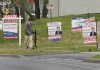 Statistics Canada said the consumer price index was up 3.6 per cent for October after excluding gasoline, following a 3.7 per cent increase for September. A person walks past multiple for-sale and sold real estate signs in Mississauga, Ont., on Wednesday, May 24, 2023. THE CANADIAN PRESS/Nathan Denette