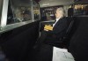 Peter Nygard arrives in a&nbsp;police vehicle to a courthouse in Toronto on Tuesday, October 3, 2023.&nbsp;Winnipeg has revoked what it calls its highest honour -- the Key to the City -- from Nygard following the former fashion mogul's conviction on four counts of sexual assault. THE CANADIAN PRESS/Cole Burston