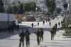 FILE - Israeli soldiers are seen in Balata, a Palestinian refugee camp in Nablus, West Bank, on Thursday, Nov. 23, 2023. Israeli forces operating in the occupied West Bank killed several Palestinians in a 24-hour period, Palestinian health officials said Sunday, Nov. 26, as a fragile pause in fighting between Israel and Hamas in the Gaza Strip entered its third day.(AP Photo/Majdi Mohammed, File)