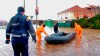 In this photo taken from video released by Russian Emergency Ministry Press Service, Russian Emergency Ministry rescuers arrive to evacuate people after storm and flooding near Evpatoria in Crimea, Monday, Nov. 27, 2023. A storm in the Black Sea took down power grids and left almost half a million people without power after it flooded roads, ripped up trees and damaged buildings in Crimea, Russian state news agency Tass said. (Russian Emergency Ministry Press Service via AP)