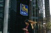 A woman walks past a Royal Bank of Canada sign in the financial district in Toronto on Tuesday, Sept. 20, 2022. THE CANADIAN PRESS/Alex Lupul