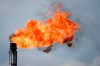 A flare stack burns off excess gas at a processing facility near Crossfield, Alta., Tuesday, June 13, 2023. Canada's oil and gas industry says the emissions cap framework announced Thursday by Ottawa could result in significant production curtailments by companies. THE CANADIAN PRESS/Jeff McIntosh